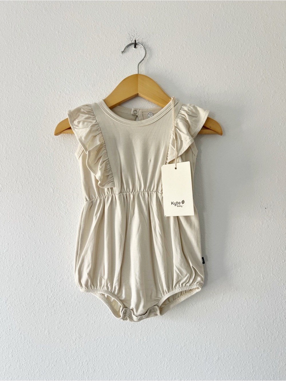 KYTE | NWT Bamboo Ruffle Romper in Beige | 6-12 mos